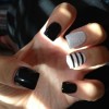 The designs of the nail black and white